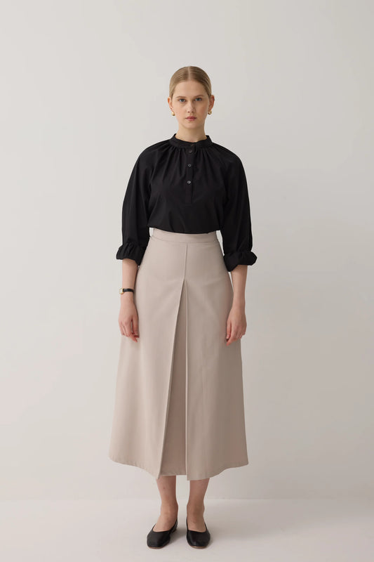 JUPE PLISSÉE À COUPE CLOCHE - MINK BEIGE
