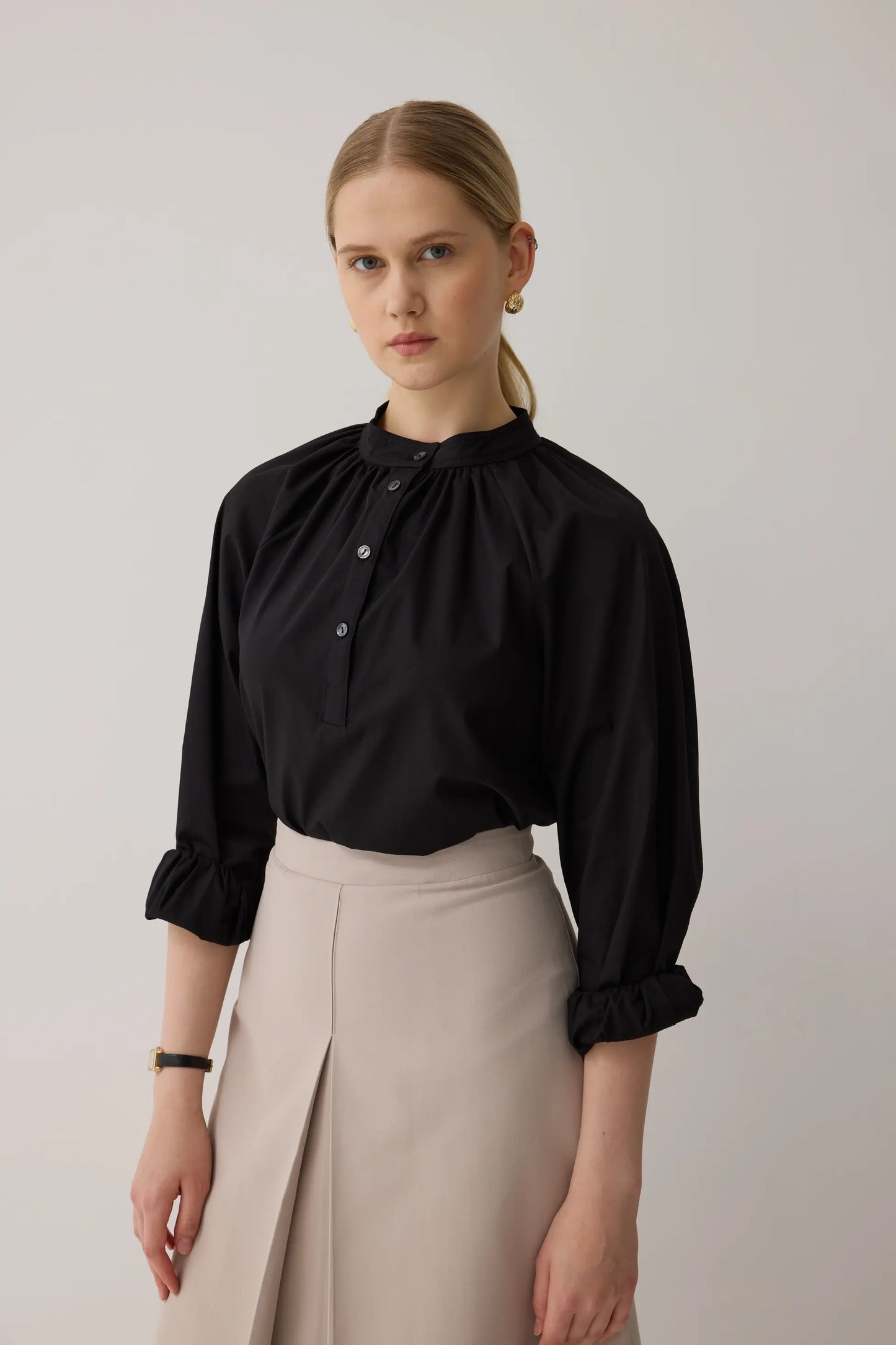 JUPE PLISSÉE À COUPE CLOCHE - MINK BEIGE