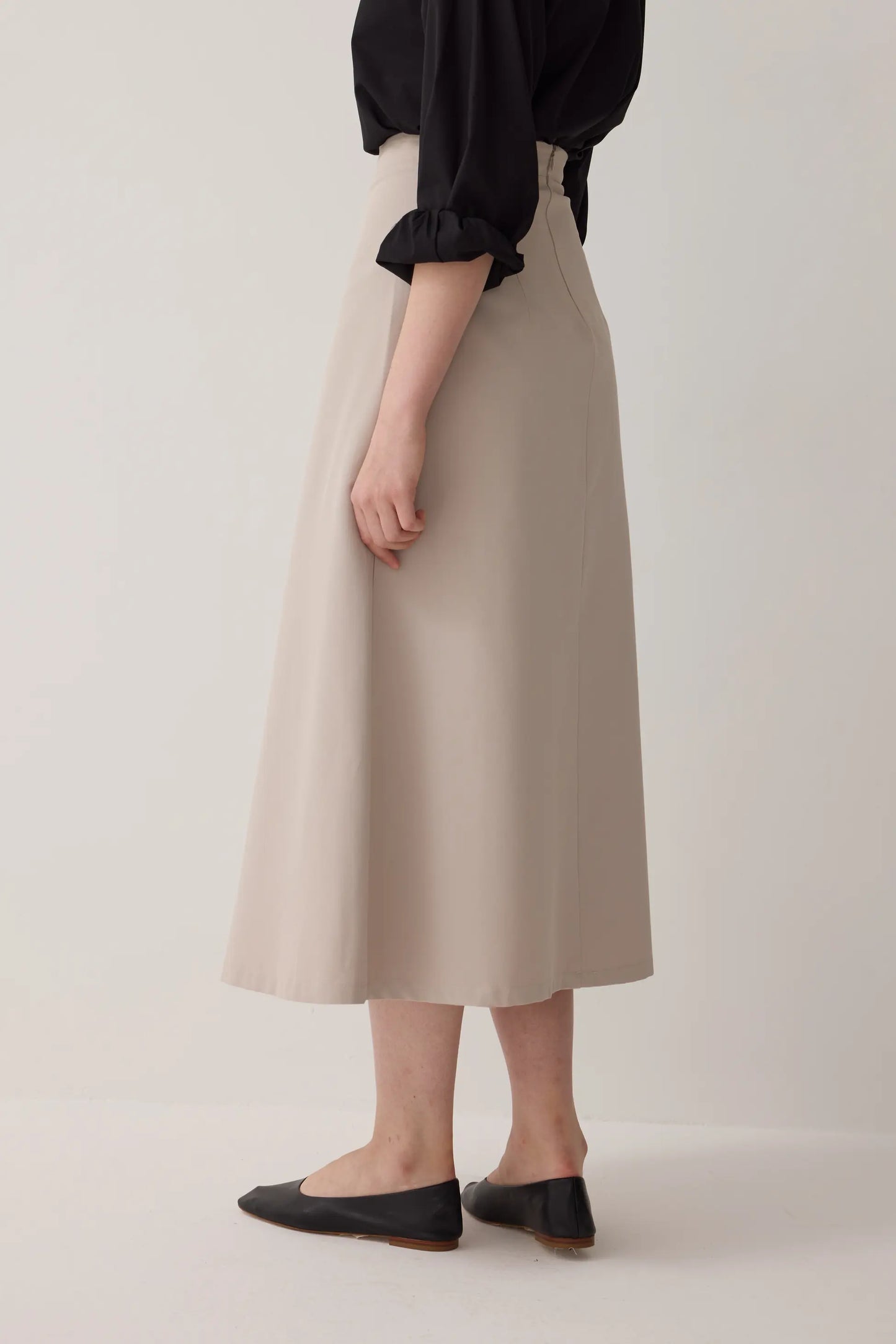 JUPE PLISSÉE À COUPE CLOCHE - MINK BEIGE