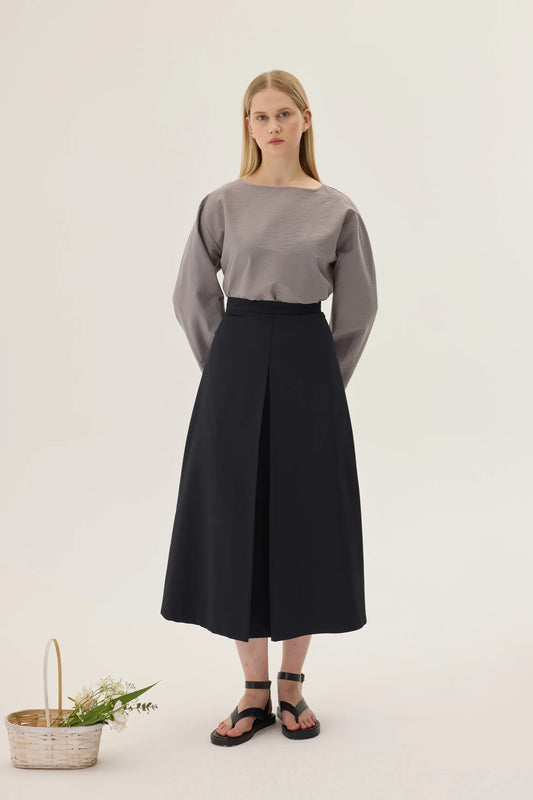 JUPE PLISSÉE À COUPE CLOCHE - NOIRE