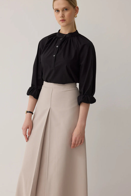 JUPE PLISSÉE À COUPE CLOCHE - MINK BEIGE